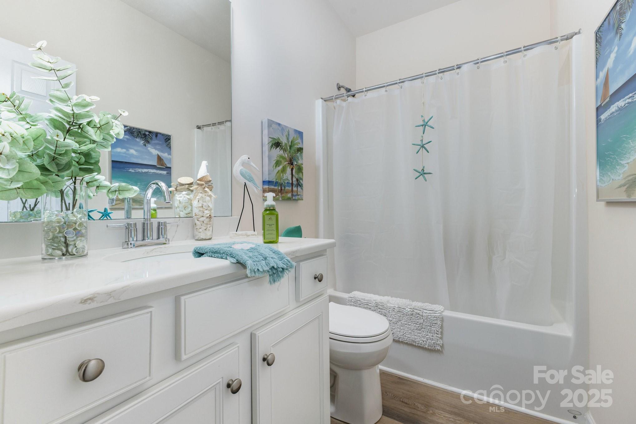 881 Platinum Drive Fort Mill, SC 29708 - Photo 24 of 35 a bathroom with a granite countertop sink a toilet and shower