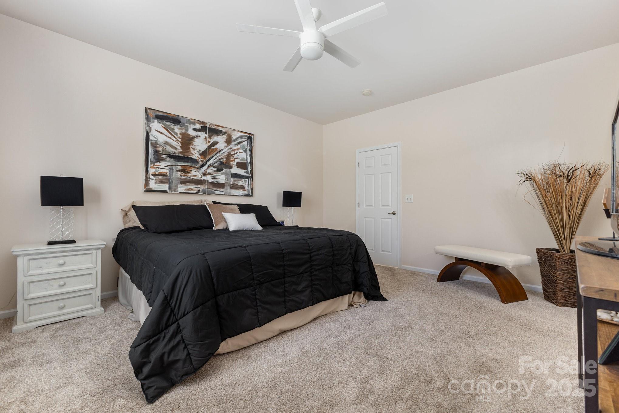 881 Platinum Drive Fort Mill, SC 29708 - Photo 27 of 35 a bedroom with a bed and a desk
