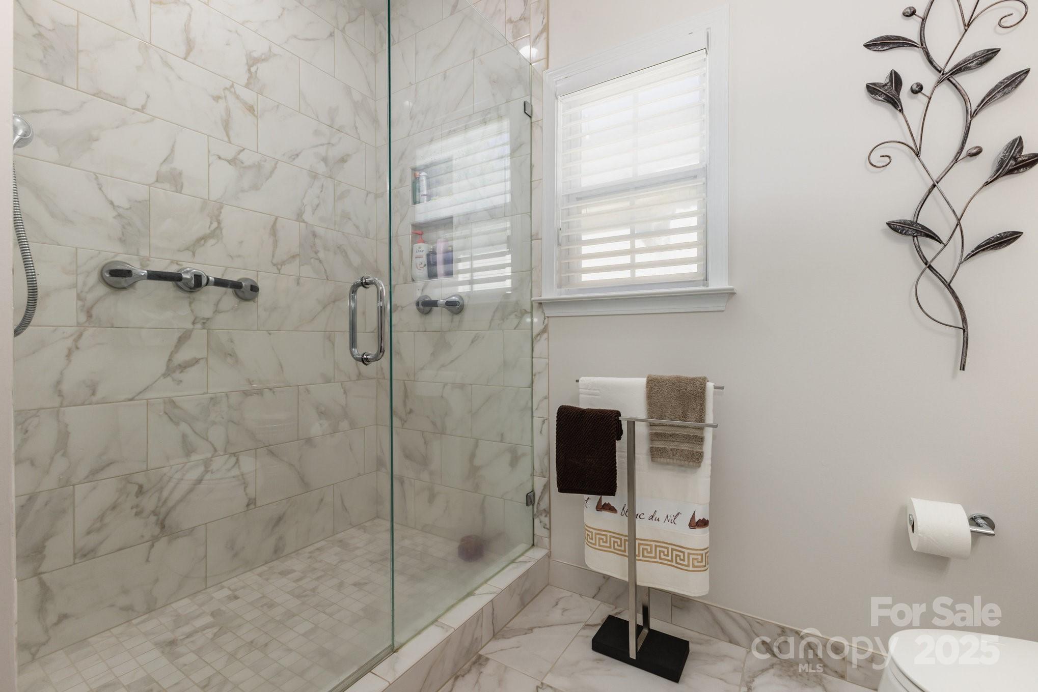 881 Platinum Drive Fort Mill, SC 29708 - Photo 32 of 35 a bathroom with a toilet and a shower