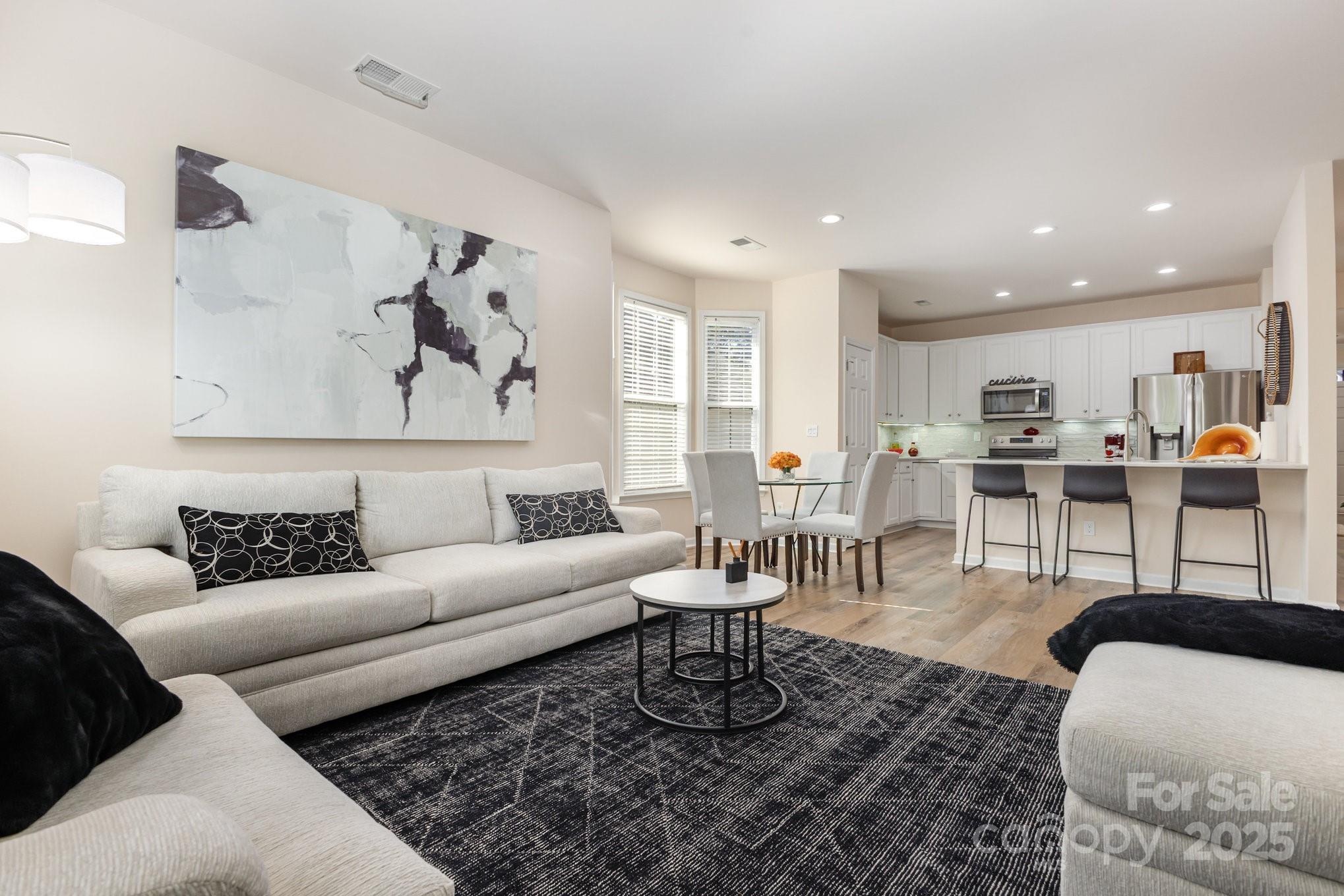 881 Platinum Drive Fort Mill, SC 29708 - Photo 9 of 35 a living room with furniture and kitchen view