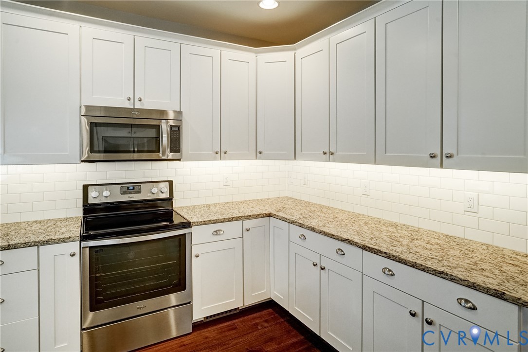 3606 Edenfield Road Midlothian, VA 23113 - Photo 23 of 67 Corner kitchen featuring white shaker cabinetry, s