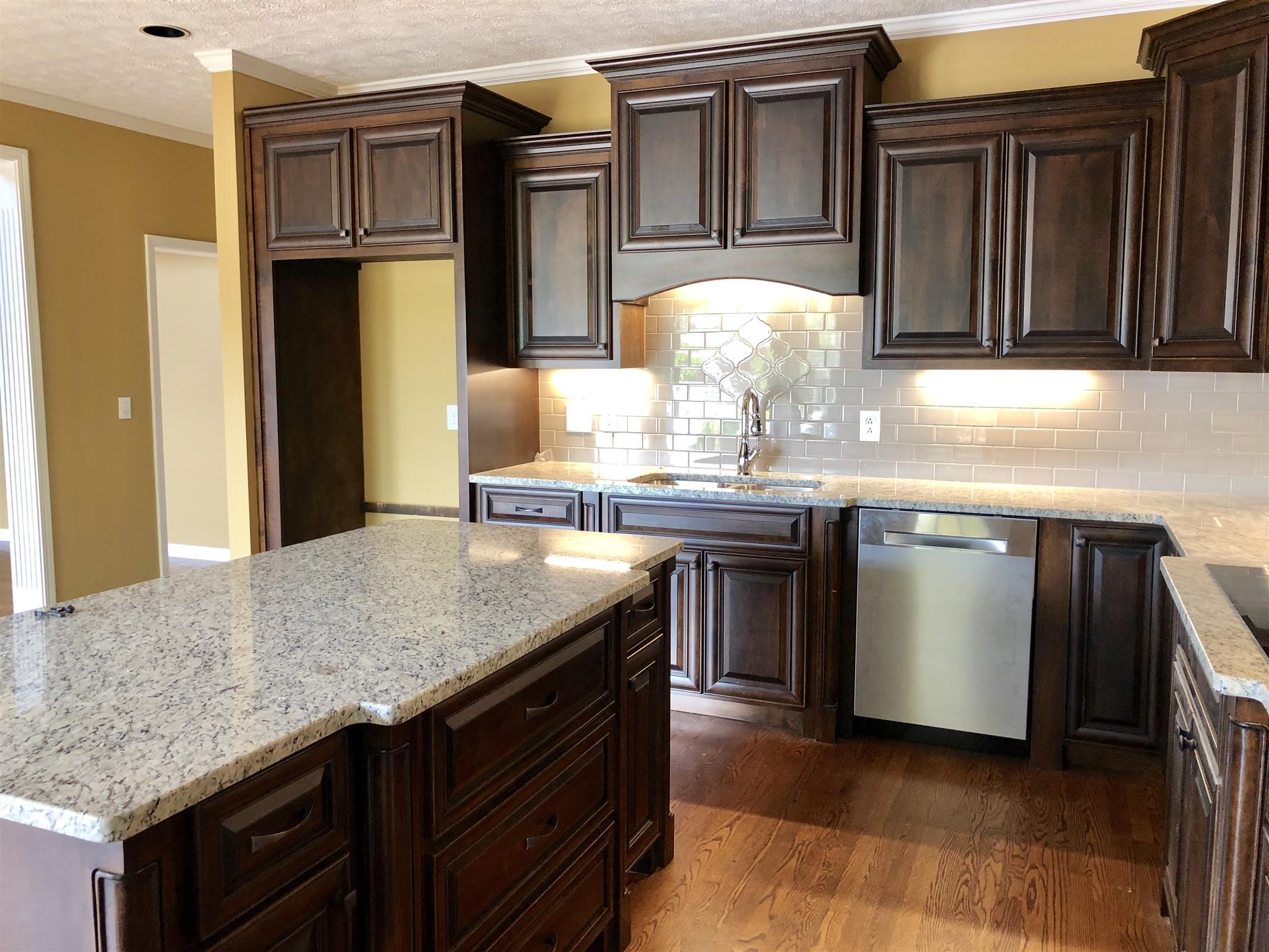 7341 Hall Road Greenbrier, TN 37073 - Photo 20 of 30 Granite Counter Tops, Tile Backsplash with Under The Counter Lighting
