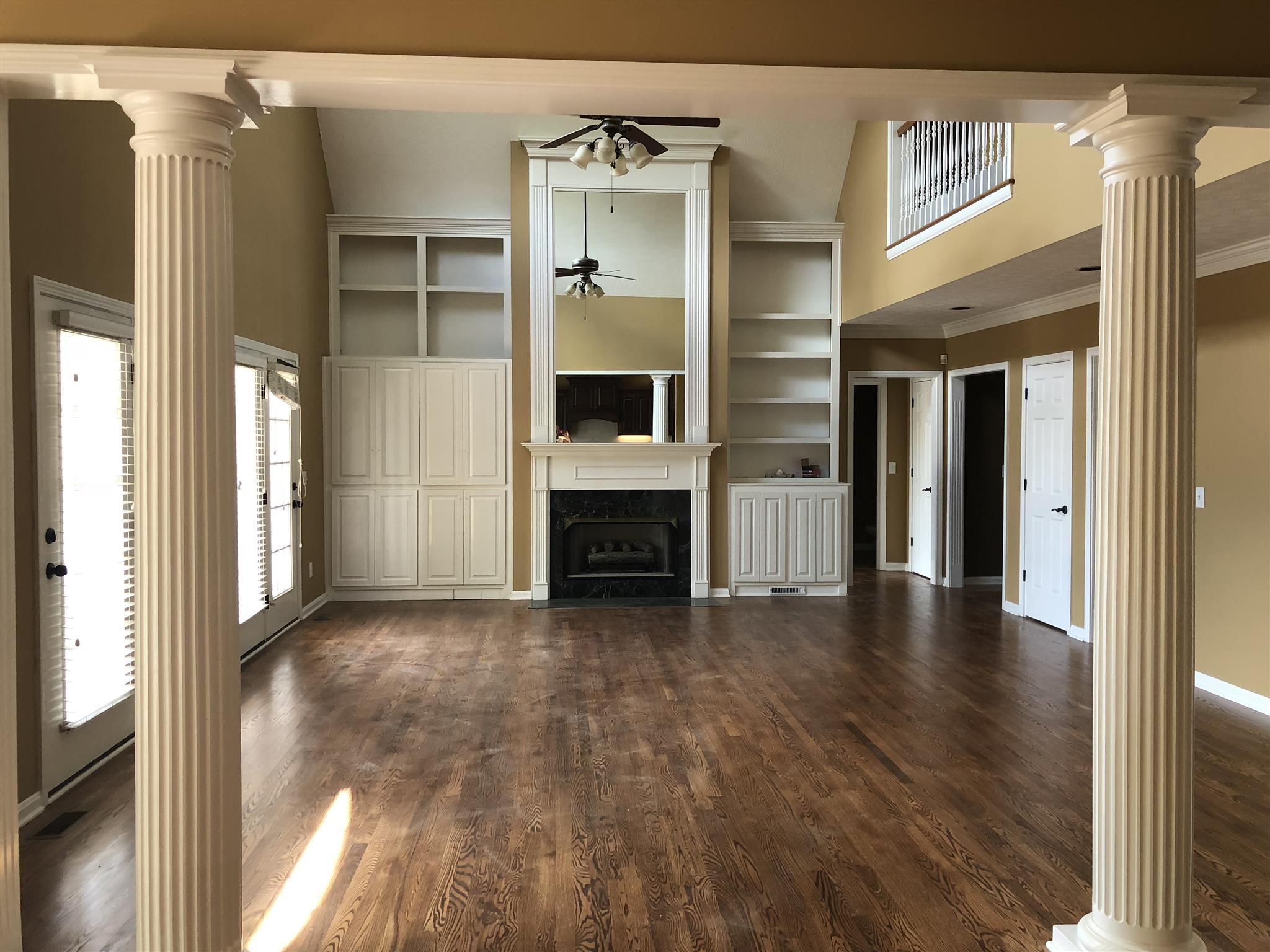7341 Hall Road Greenbrier, TN 37073 - Photo 23 of 30 Den with Built in Bookshelves and Fireplace is open to the Kitchen. An Entertainers dream