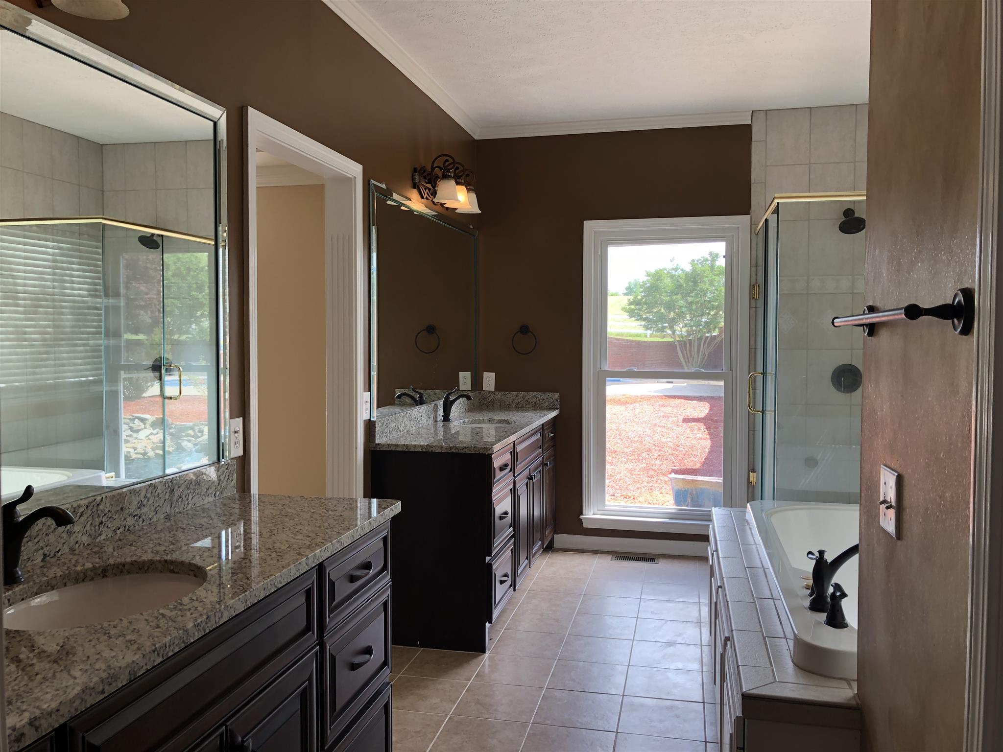7341 Hall Road Greenbrier, TN 37073 - Photo 28 of 30 The Master Bath boasts Double Vanities, Whirlpool Tub, Shower, Toilet Room & Custom Built Walk in Closet