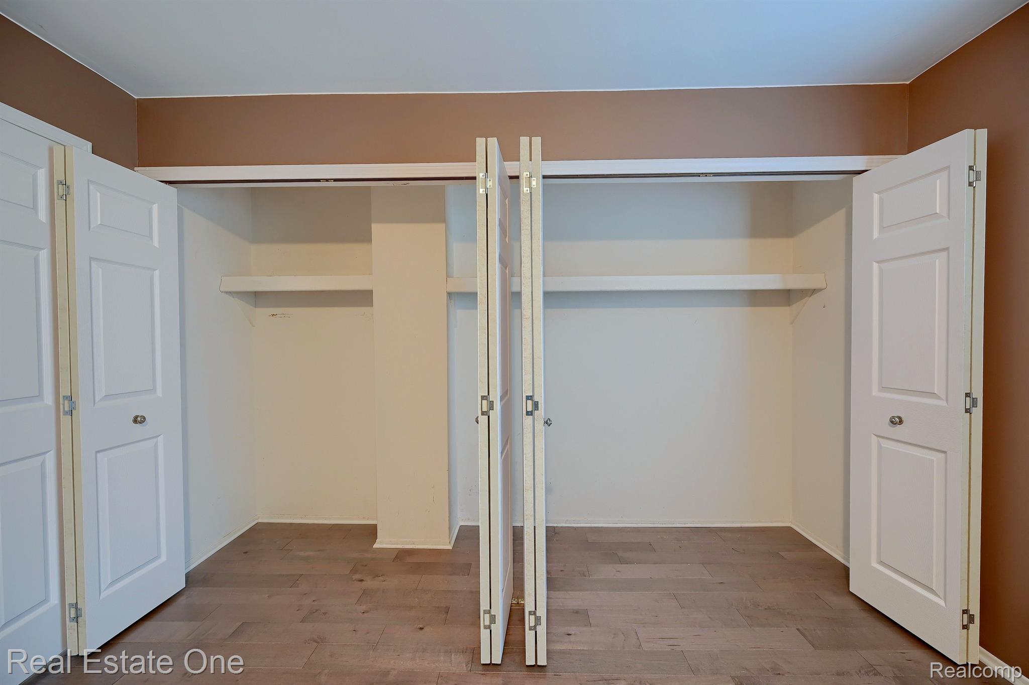 1372 Crescent Lane, Unit 301 Rochester, MI 48306 - Photo 16 of 41 Full Wall of Closets!