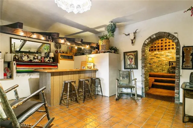 a view of swimming pool with outdoor seating