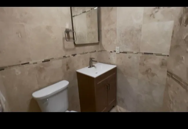a bathroom with a sink and a toilet