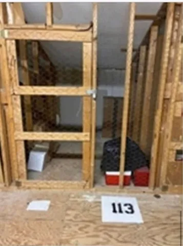 a living room with a couch and a fireplace