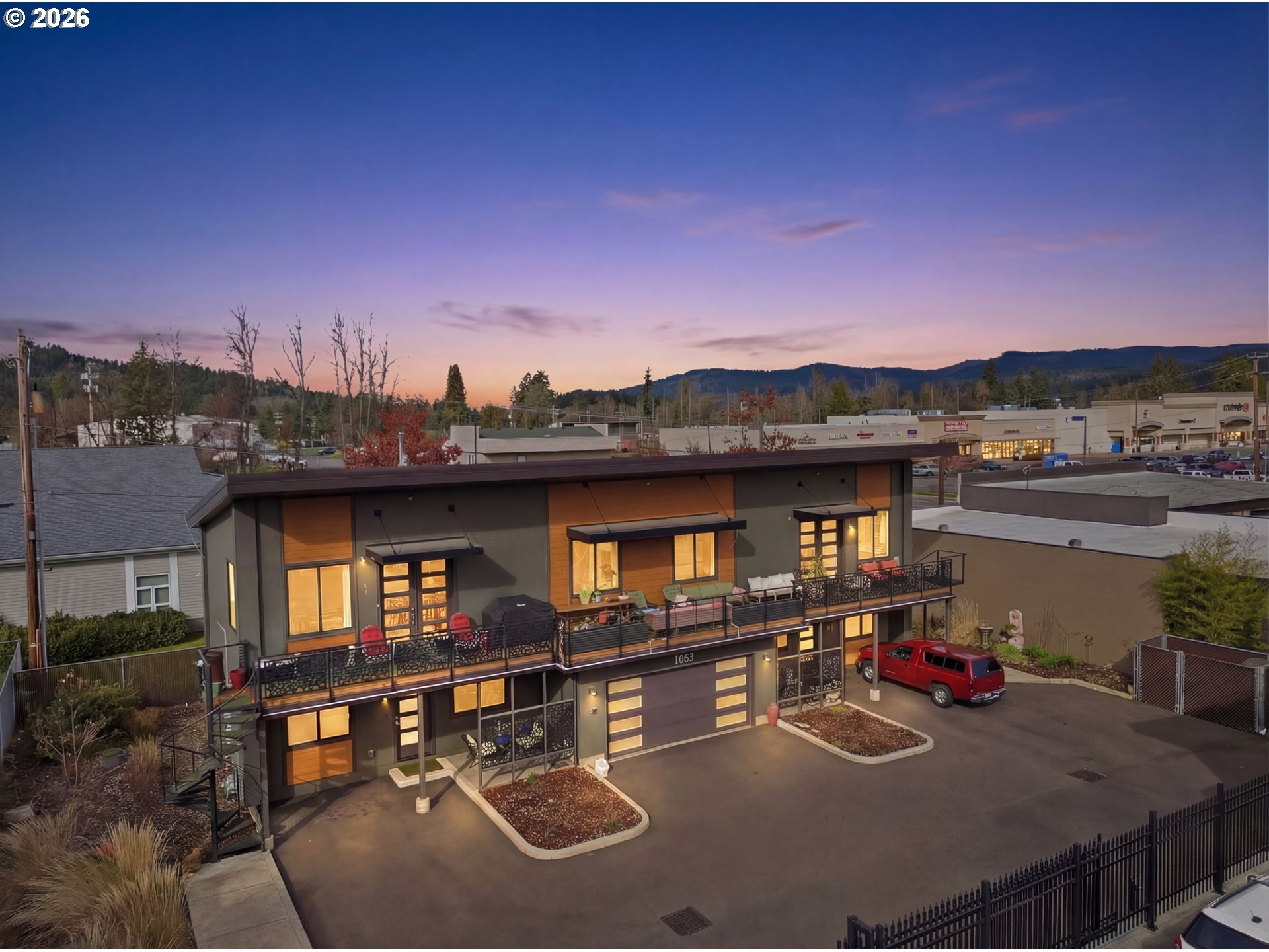 a view of a balcony with sitting area