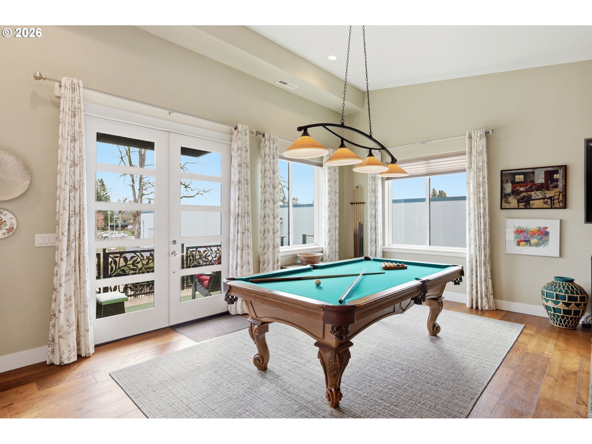 1308 East Main Street Cottage Grove, OR 97424 - Photo 11 of 48 a room with pool table and windows