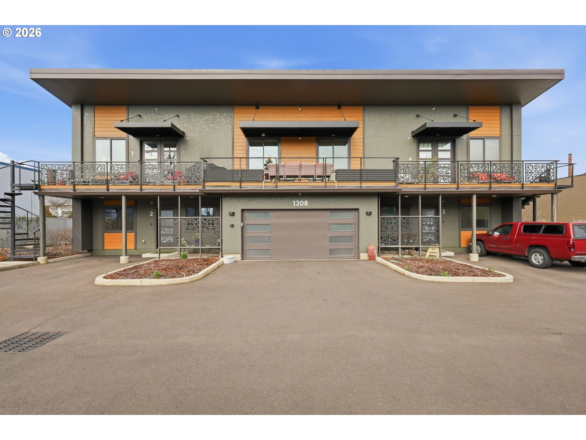 1308 East Main Street Cottage Grove, OR 97424 - Photo 3 of 48 a view of a building with sitting area