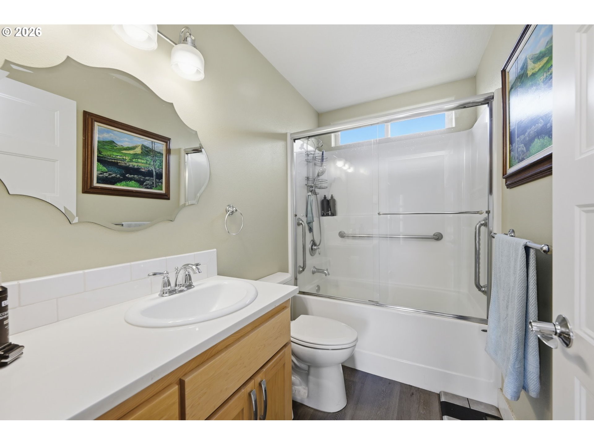 1308 East Main Street Cottage Grove, OR 97424 - Photo 33 of 48 a bathroom with a sink a toilet and shower