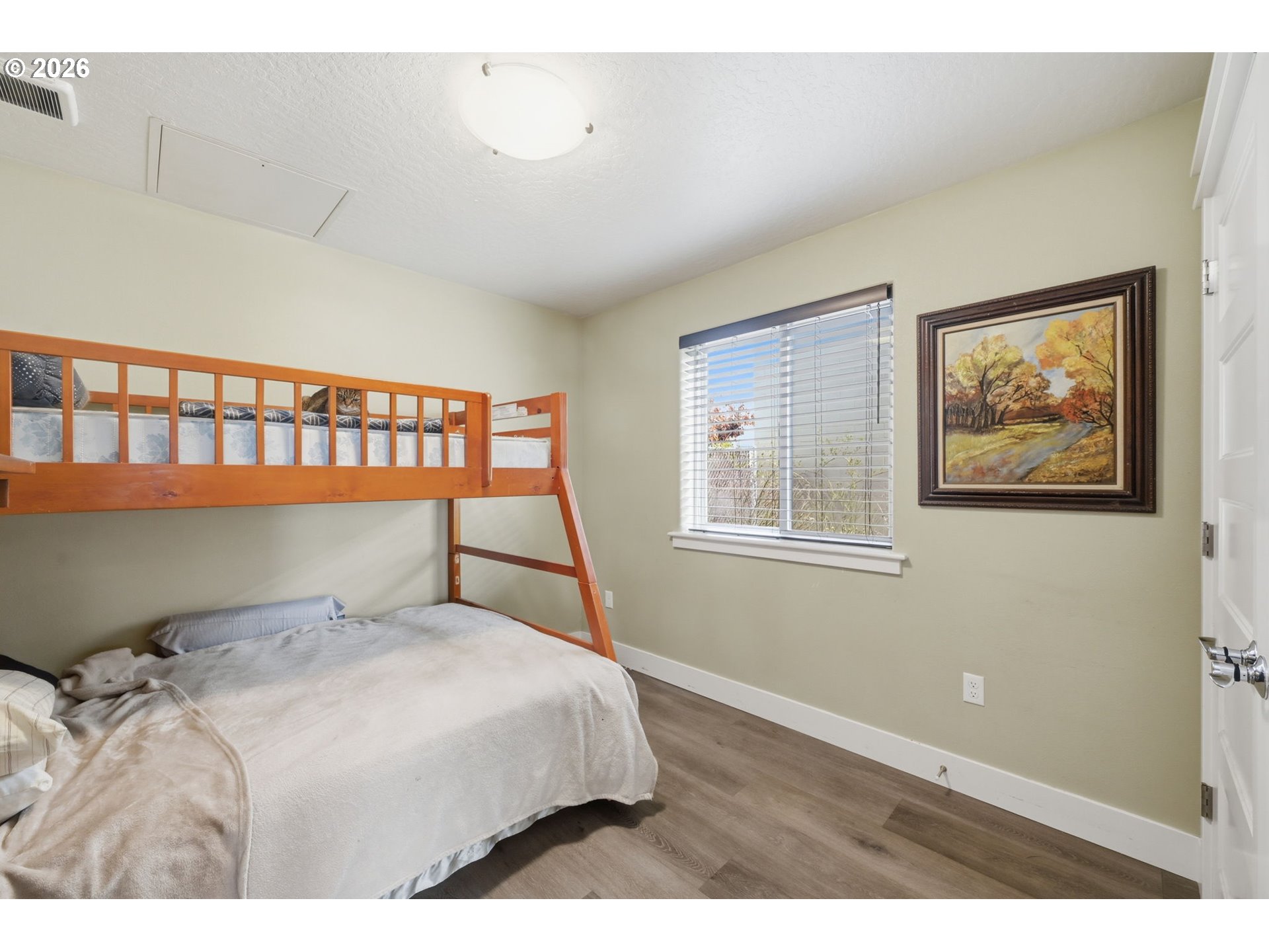 1308 East Main Street Cottage Grove, OR 97424 - Photo 34 of 48 a bedroom with a bed and a window