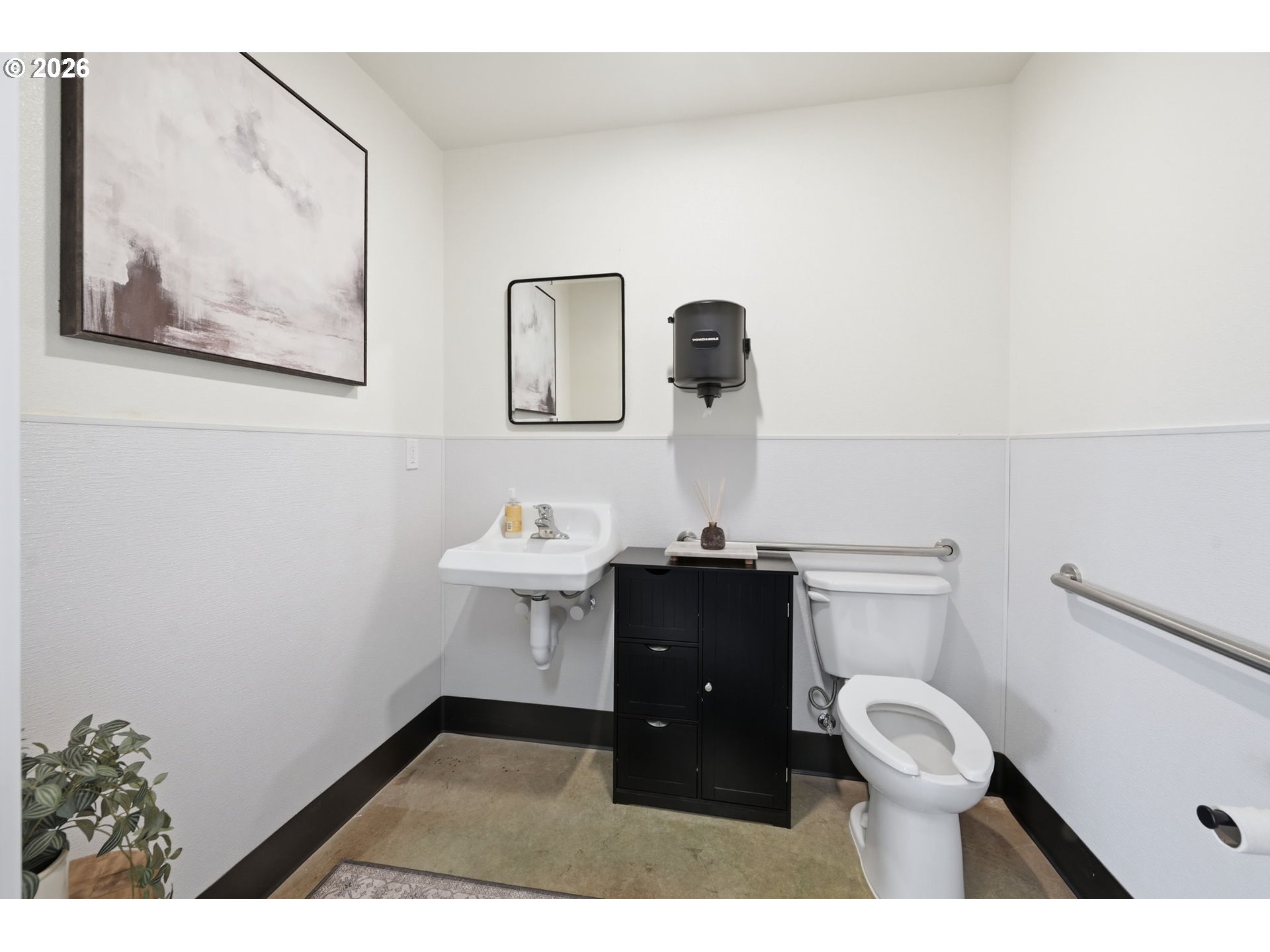 1308 East Main Street Cottage Grove, OR 97424 - Photo 44 of 48 a view of bathroom with a toilet sink and mirror