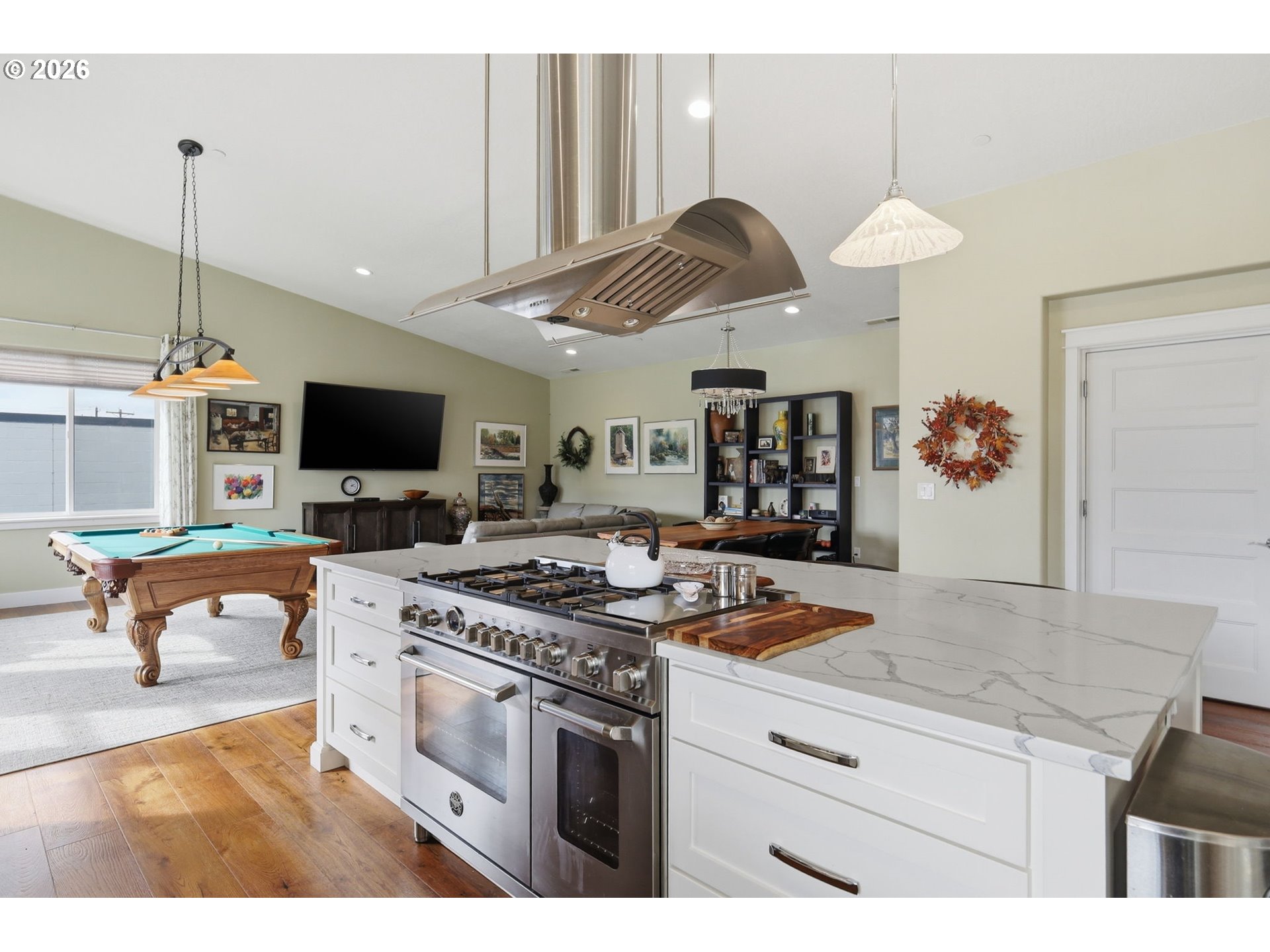1308 East Main Street Cottage Grove, OR 97424 - Photo 8 of 48 a kitchen with stainless steel appliances granite countertop a stove a sink and a microwave