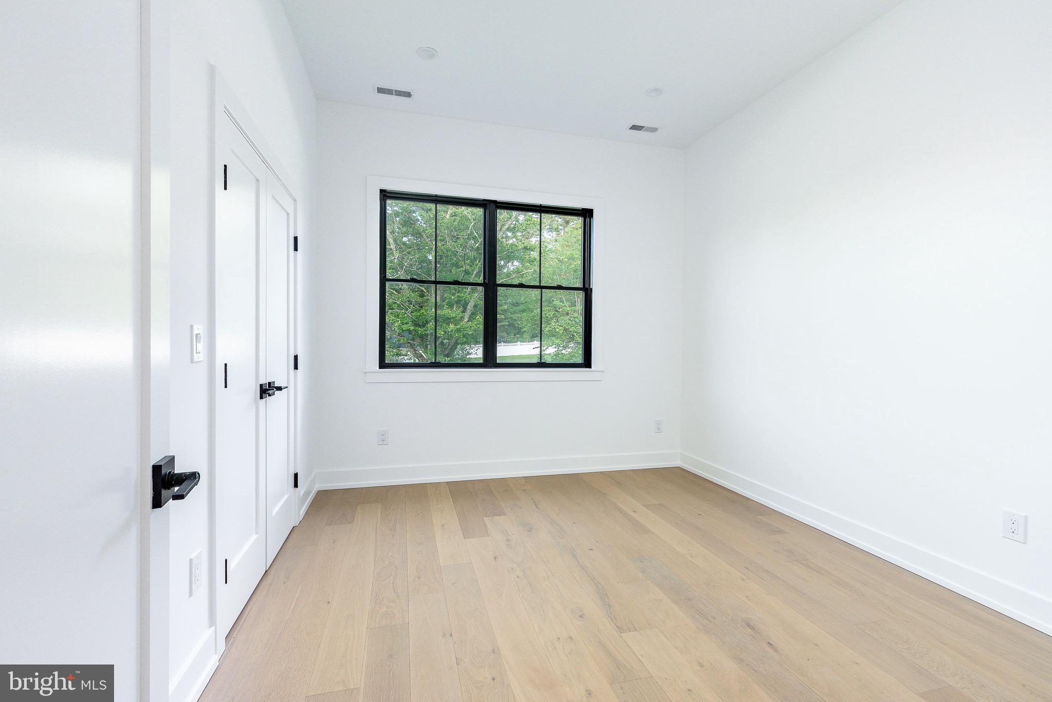 918 Ethan Allen Road Berwyn, PA 19312 - Photo 53 of 77 wooden floor in an empty room