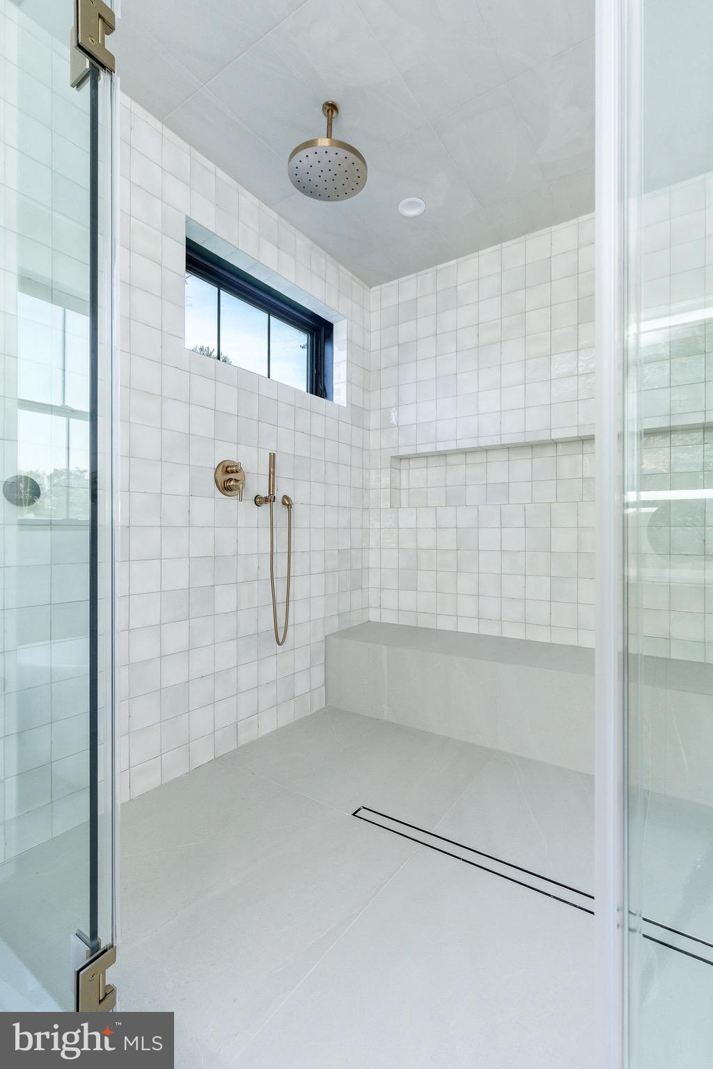 918 Ethan Allen Road Berwyn, PA 19312 - Photo 58 of 77 a bathroom with a glass shower door