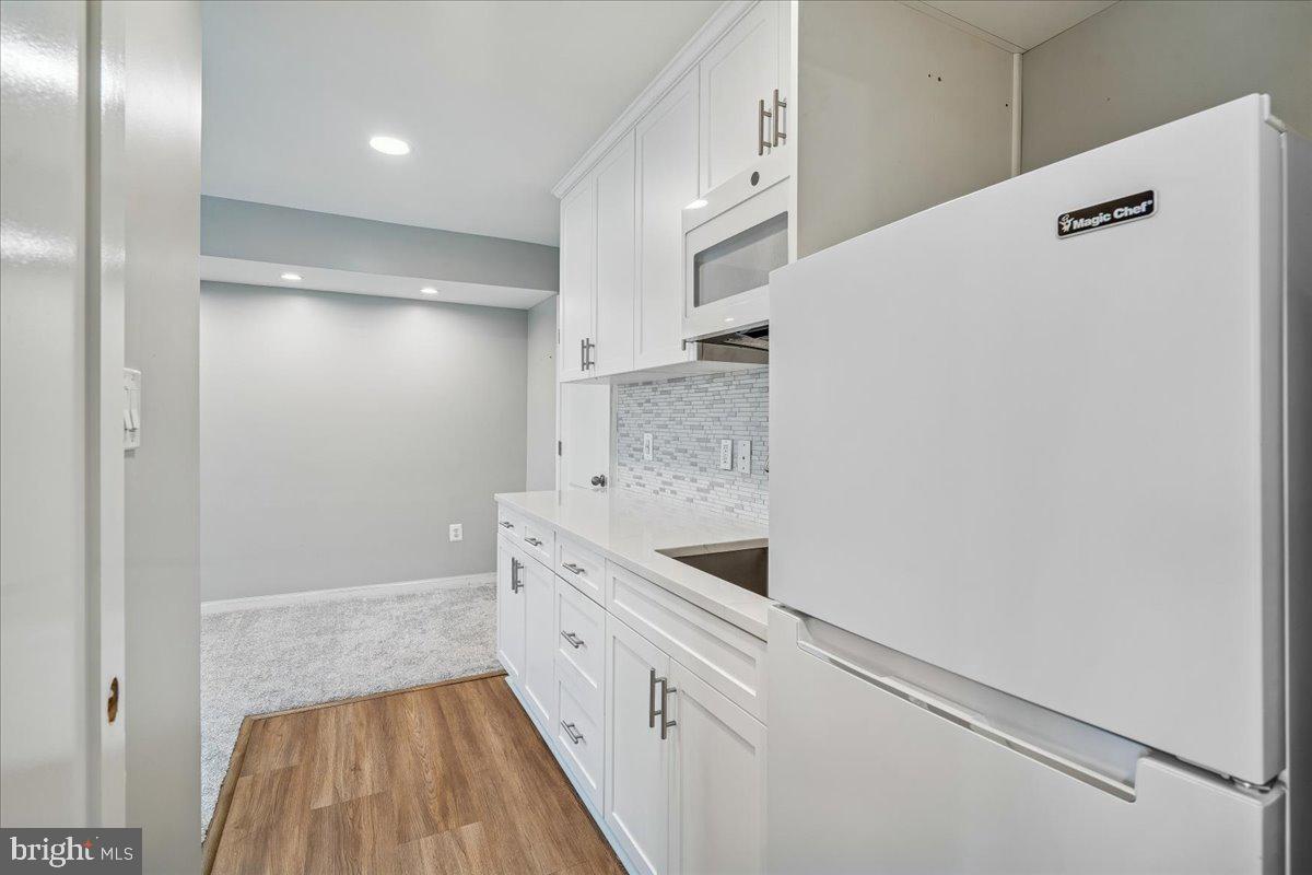 8587 Crooked Tree Lane Laurel, MD 20724 - Photo 22 of 35 Lower level kitchenette