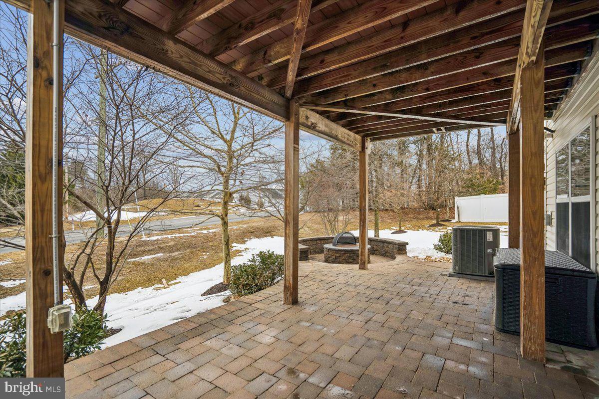 8587 Crooked Tree Lane Laurel, MD 20724 - Photo 28 of 35 View of patio and fire pit