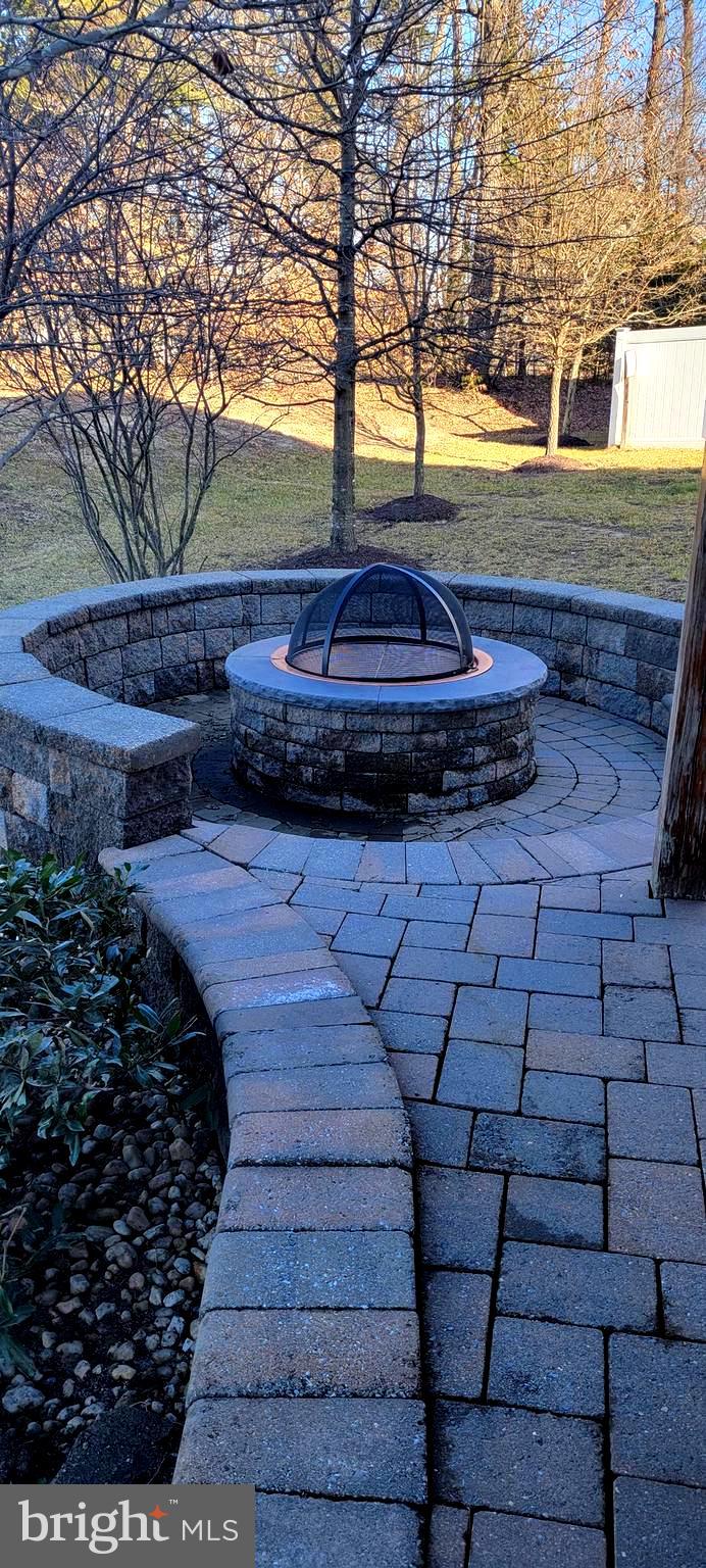 8587 Crooked Tree Lane Laurel, MD 20724 - Photo 29 of 35 Custom fireplace and patio
