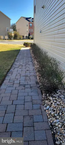 a view of a backyard of the house