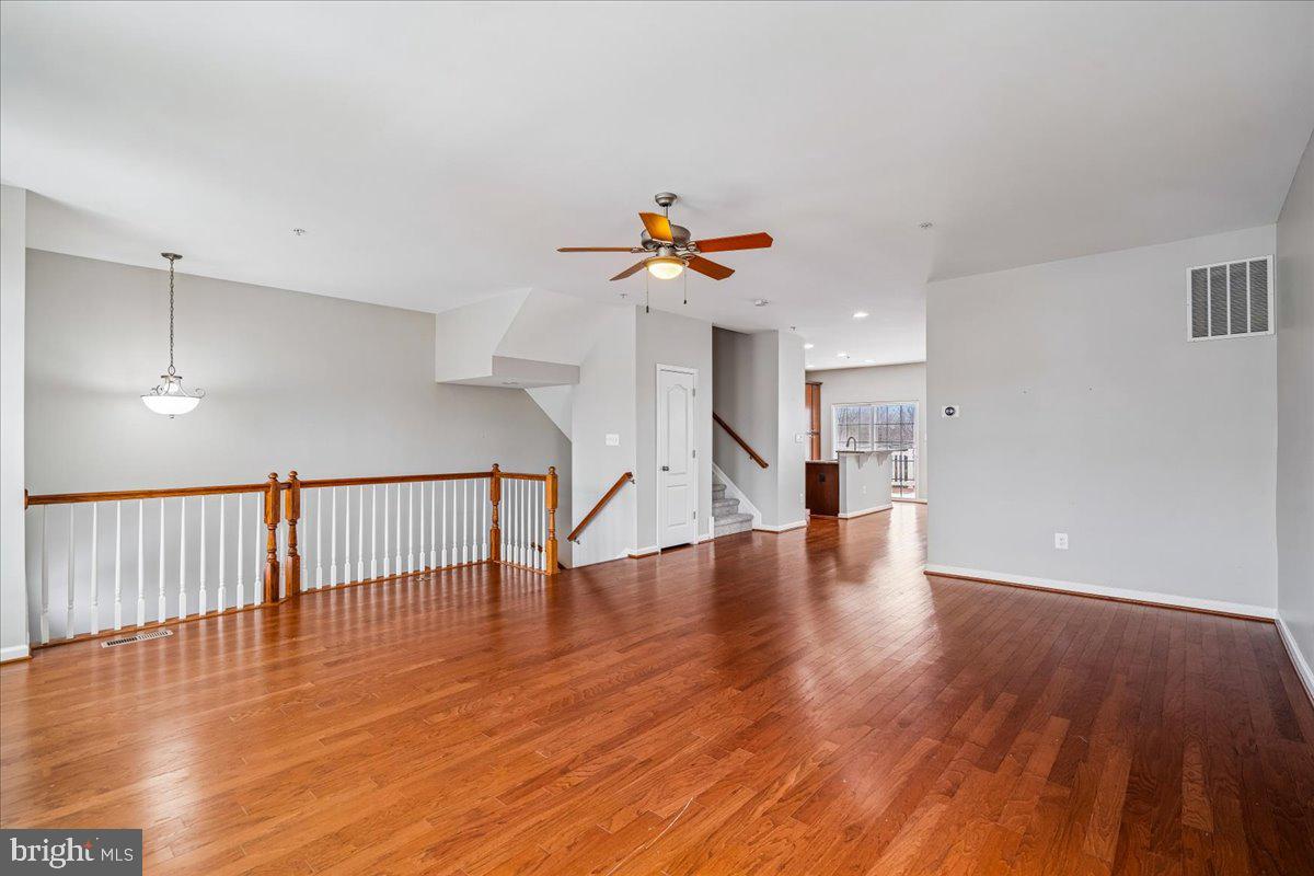 8587 Crooked Tree Lane Laurel, MD 20724 - Photo 6 of 35 Living room towards kitchen