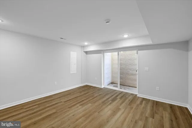 a view of wooden floor in an empty room