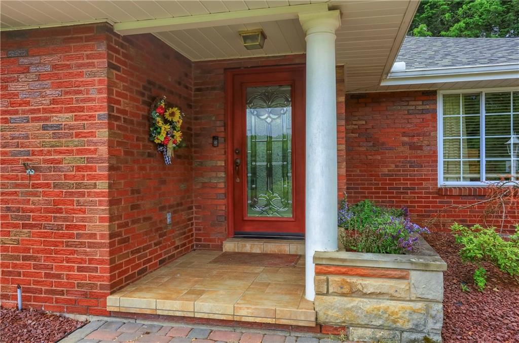 119 Beacon Road Renfrew, PA 16053 - Photo 5 of 49 a front view of a house with a yard