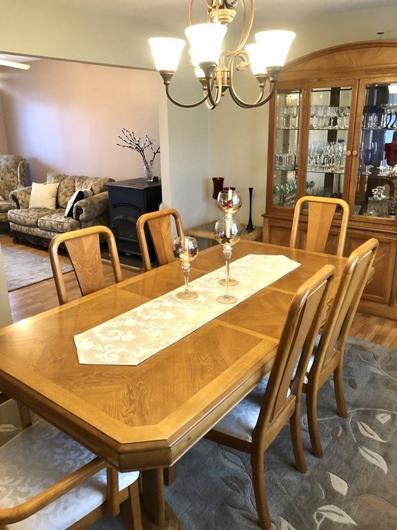 266 River Road Sunderland, MA 01375 - Photo 17 of 38 a room with table chairs and a view of living room