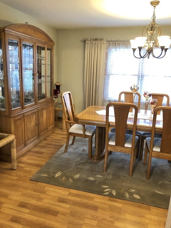 266 River Road Sunderland, MA 01375 - Photo 18 of 38 a view of a dining room with furniture window and wooden floor