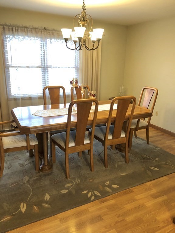 266 River Road Sunderland, MA 01375 - Photo 19 of 38 a view of a dining room with furniture window and outside view