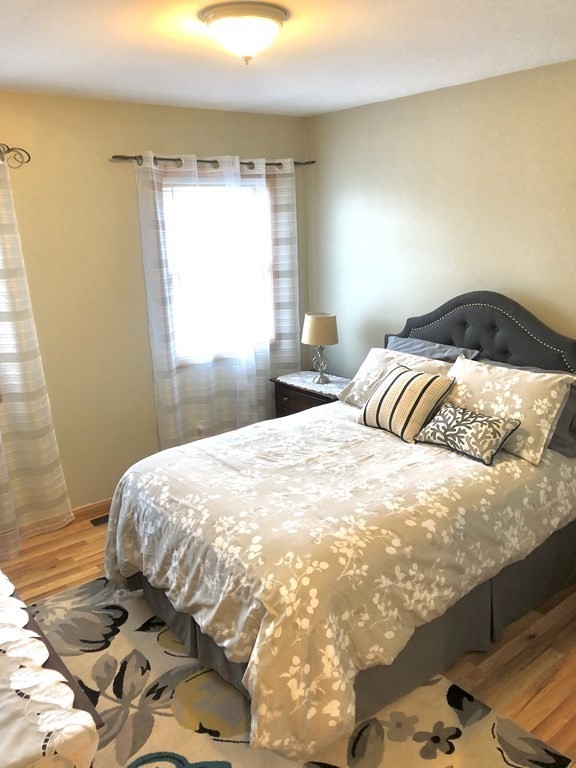 266 River Road Sunderland, MA 01375 - Photo 21 of 38 a bedroom with a bed and window