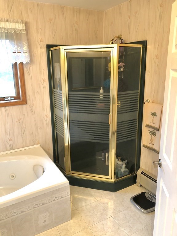 266 River Road Sunderland, MA 01375 - Photo 29 of 38 a bathroom with a bathtub and shower