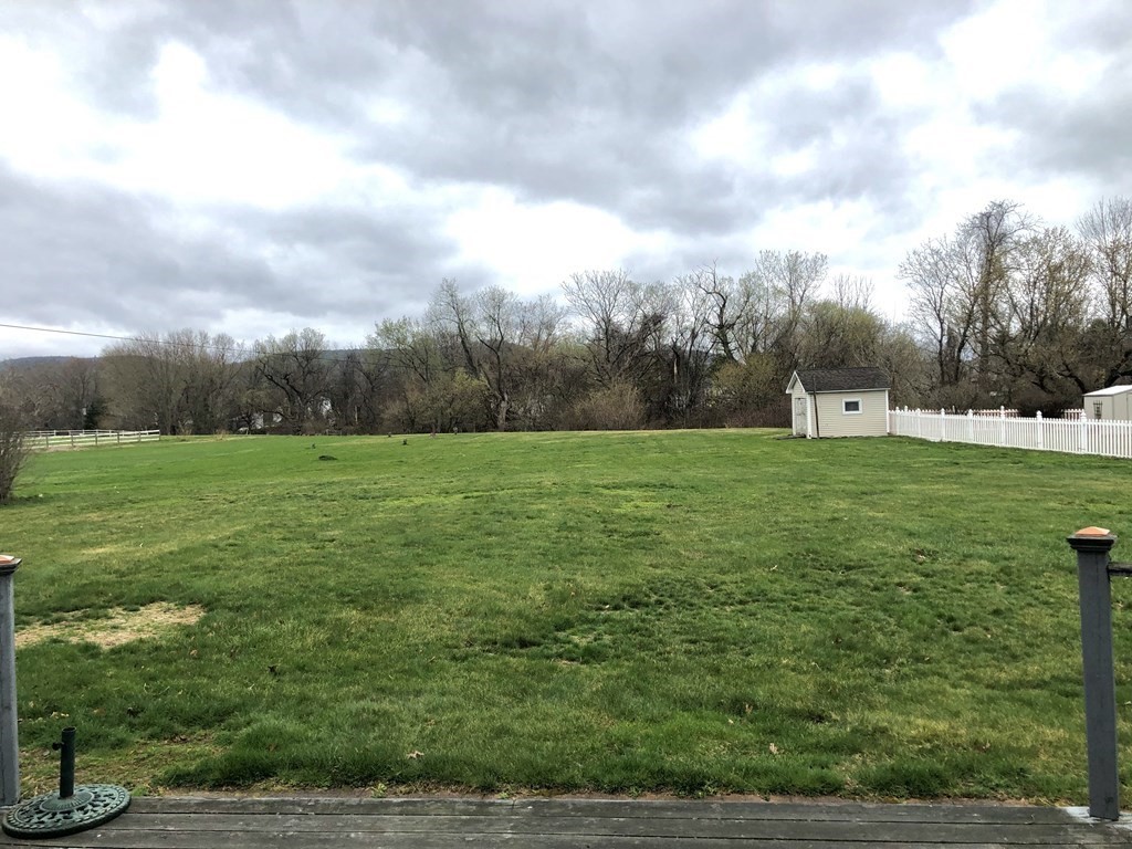 266 River Road Sunderland, MA 01375 - Photo 38 of 38 a view of a green field with wooden fence