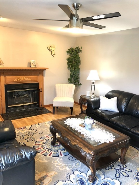 266 River Road Sunderland, MA 01375 - Photo 7 of 38 a living room with furniture and a fireplace