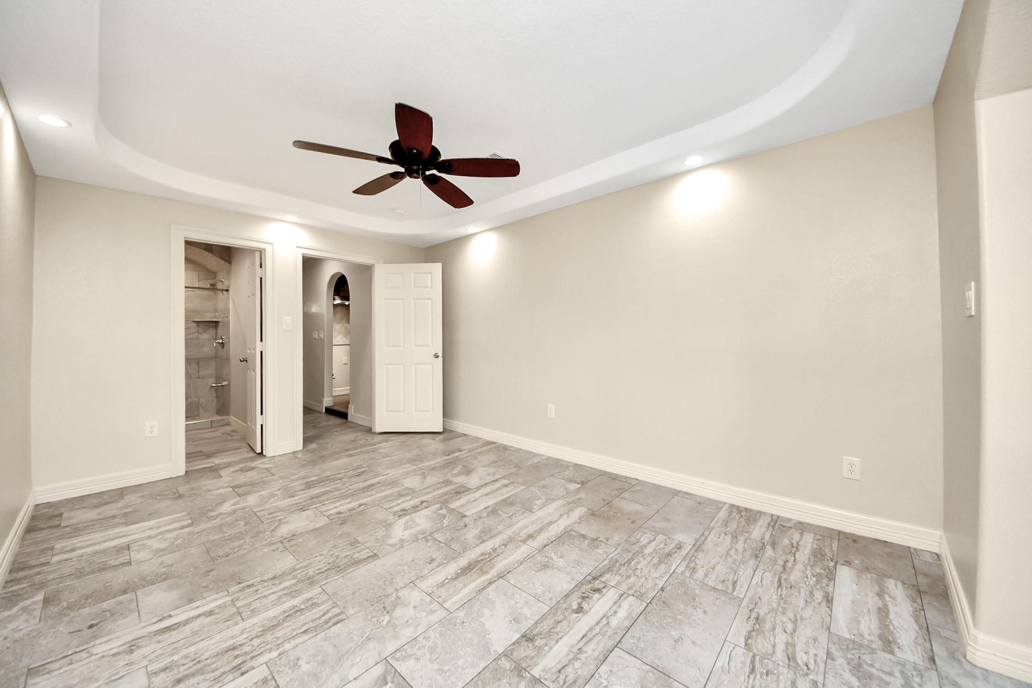 8925 Homewood Lane Houston, TX 77078 - Photo 16 of 28 a view of empty room with wooden floor