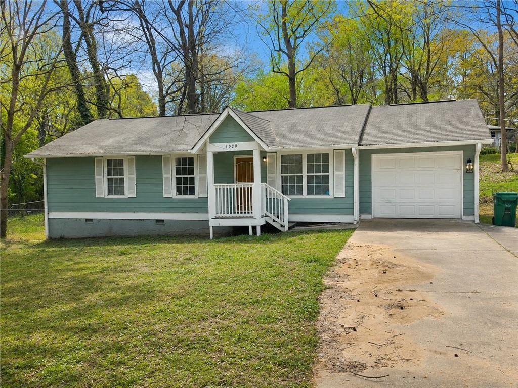 1929 Wee Kirk Road Southeast Atlanta, GA 30316 - Photo 3 of 22 a view of a house with a garden