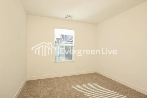 a workspace with furniture and window