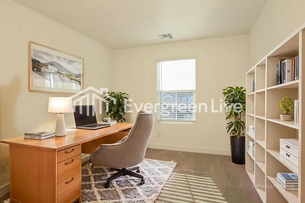 a view of an empty room with a window