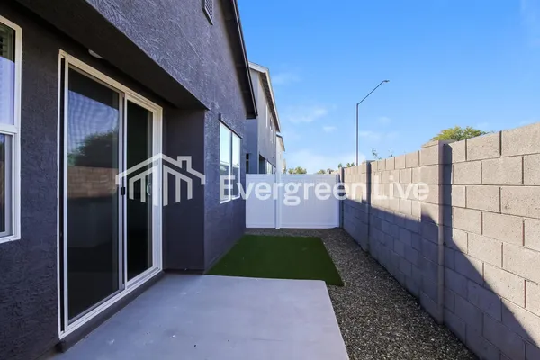 a view of a swimming pool with outdoor seating
