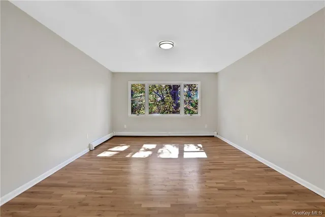 a view of an empty room with window