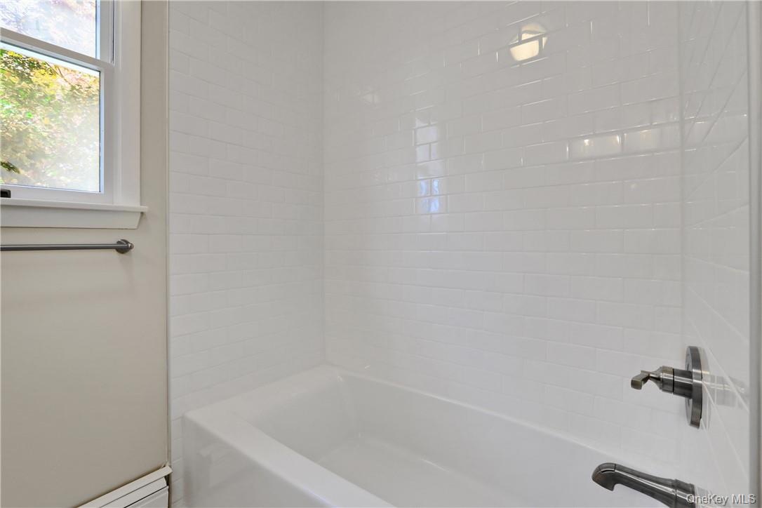 2 Requa Street Briarcliff Manor, NY 10510 - Photo 21 of 36 a close view of a bathtub in bathroom
