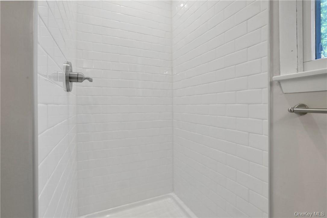 2 Requa Street Briarcliff Manor, NY 10510 - Photo 24 of 36 a close up of a shower