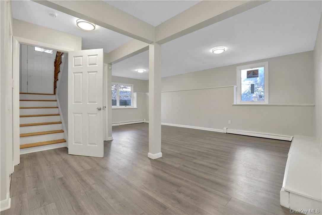 2 Requa Street Briarcliff Manor, NY 10510 - Photo 29 of 36 an empty room with wooden floor