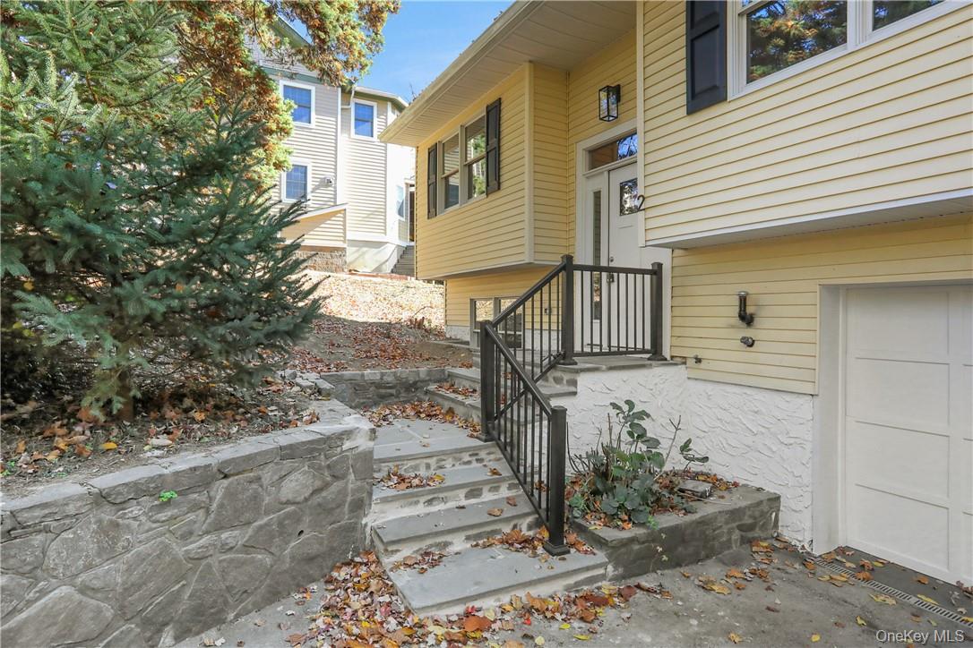 2 Requa Street Briarcliff Manor, NY 10510 - Photo 35 of 36 a front view of a house with a yard
