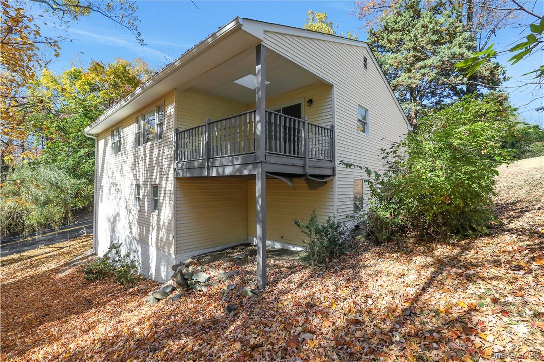 2 Requa Street Briarcliff Manor, NY 10510 - Photo 36 of 36 a front view of a house with a yard