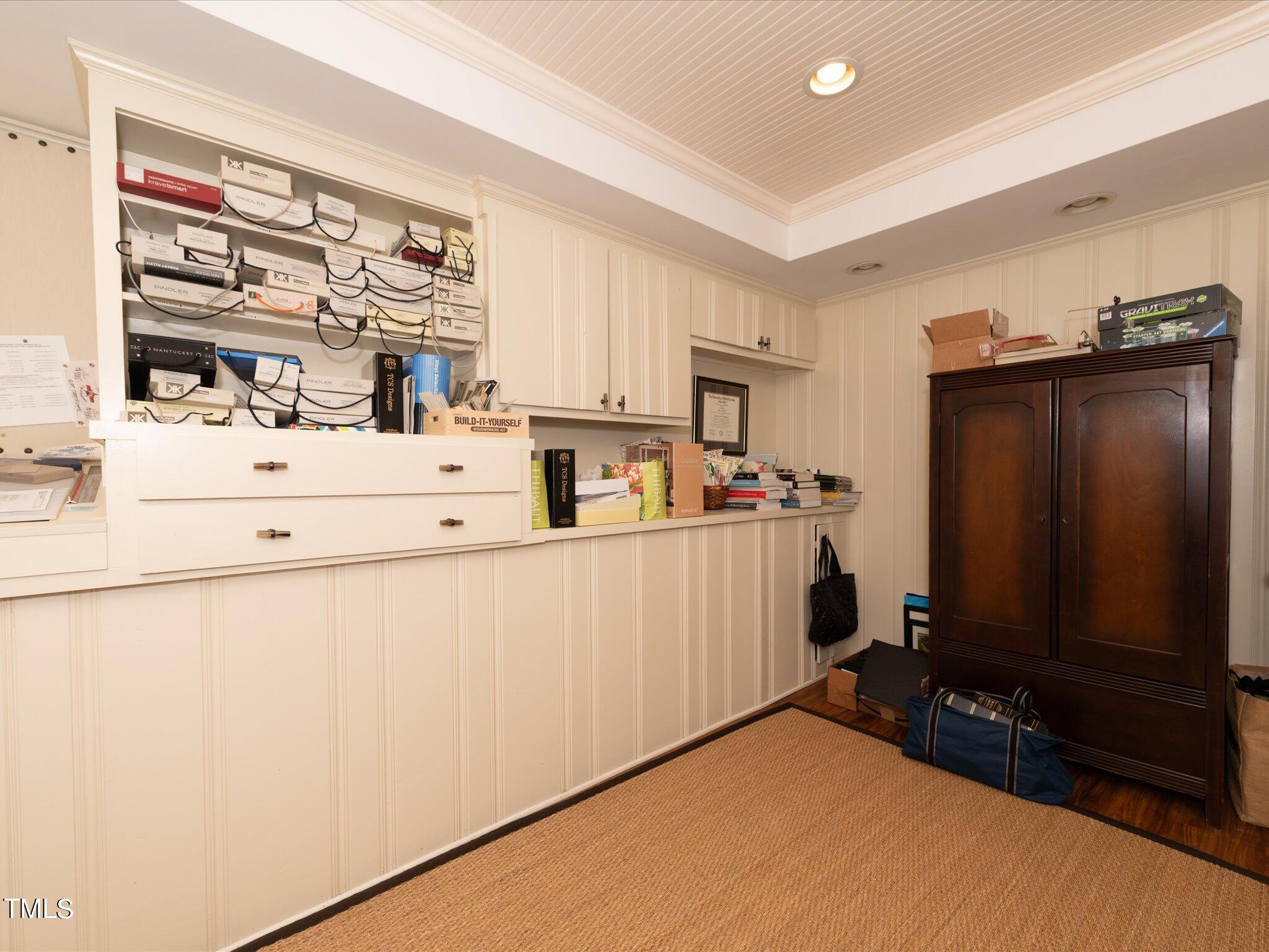 2622 Dover Road Raleigh, NC 27608 - Photo 55 of 72 a utility room with cabinets washer and dryer