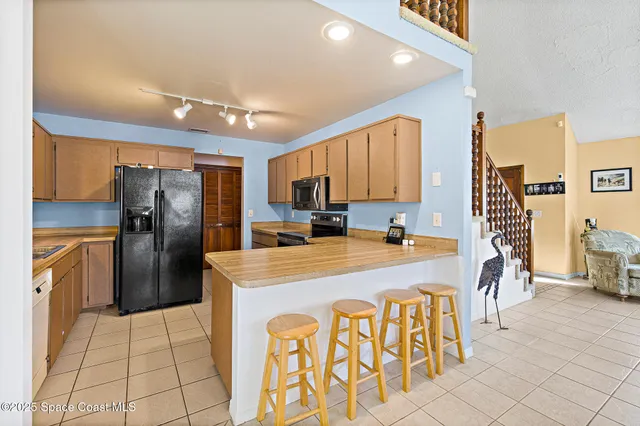 a view of bike storage next to a road