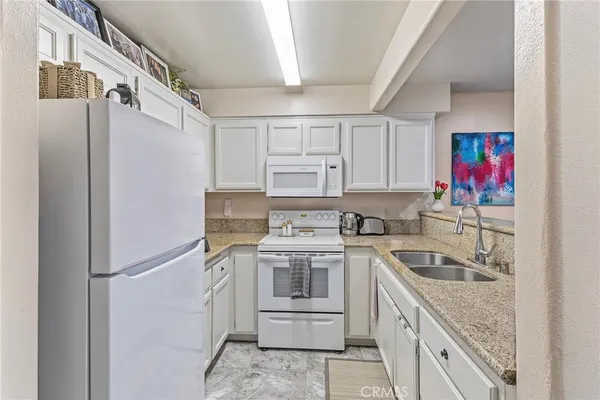 $344,000 | 11410 Brookshire Avenue, Unit 117, Downey, CA 90241
