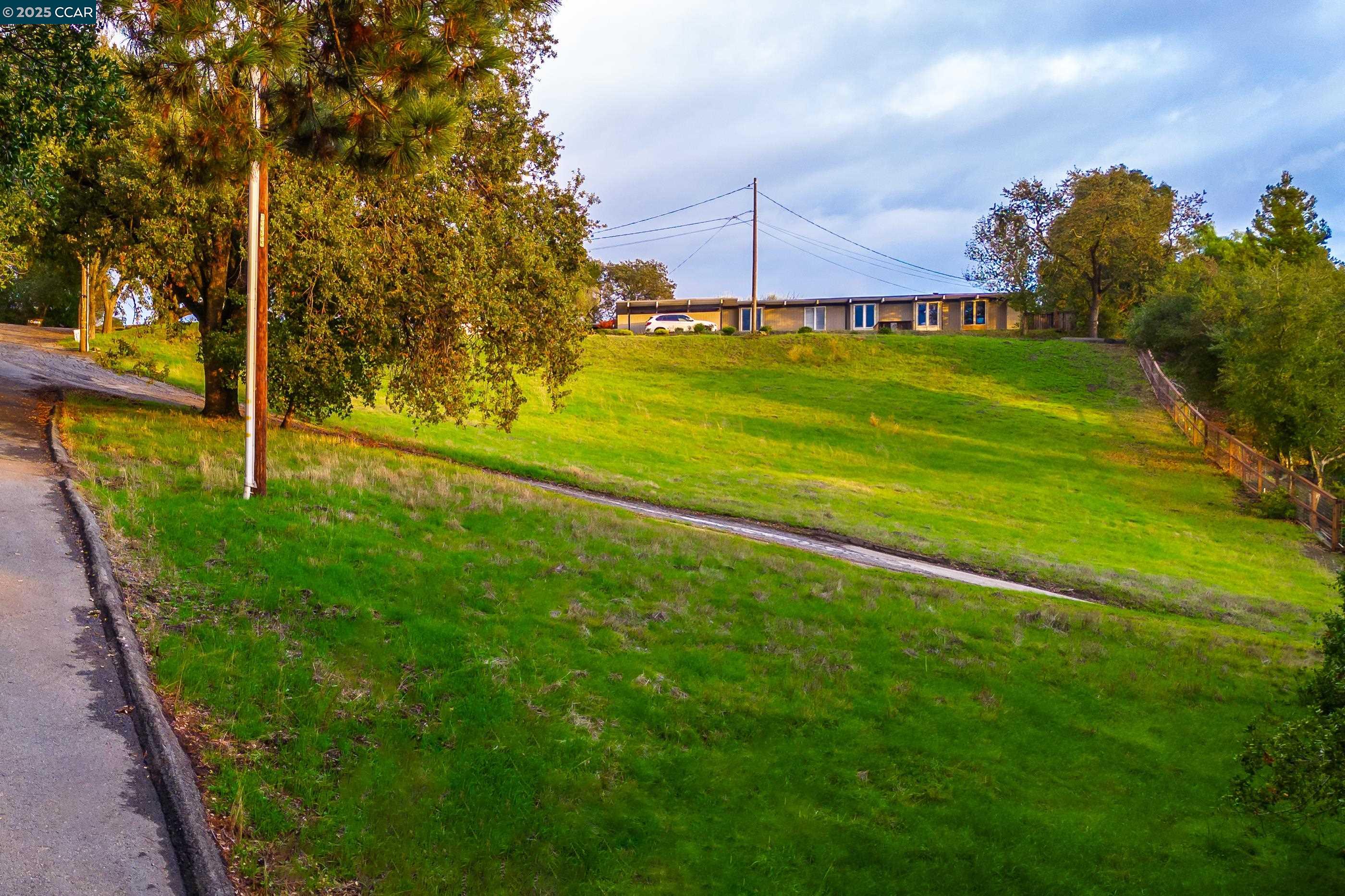 a view of a golf course with a lake view